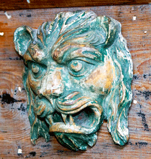 carved wooden lion's head from the corner of a Barnum & Bailey circus wagon